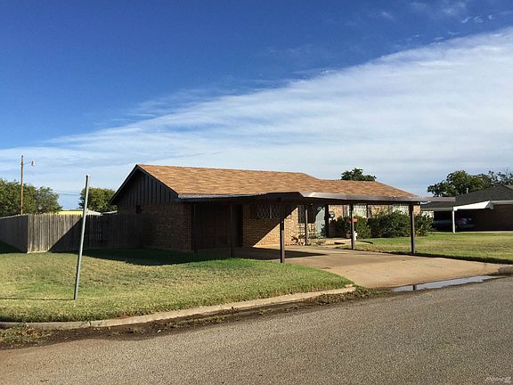 LOCATED ON A LARGE CORNER LOT