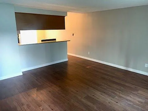 PREVIOUSLY REMODELED (BROWN VYNL FLOORING)