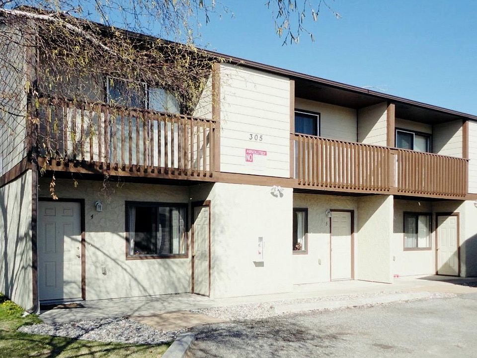 Four-unit building with two story, large units.