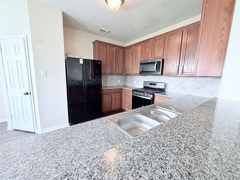 7403 Bering Landing Dr — Photo 24