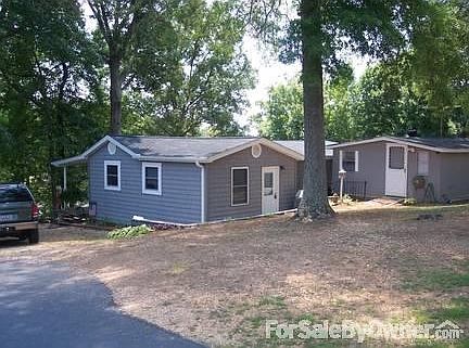 Road side, quiet road, good neighbors
						:
						Hobby shed or could be guest house.