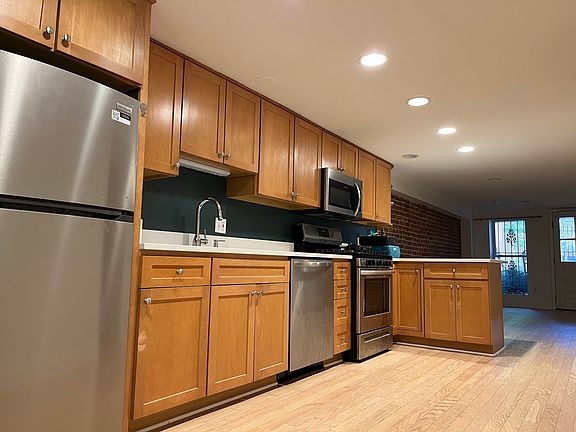 Spacious open plan kitchen with updated appliances