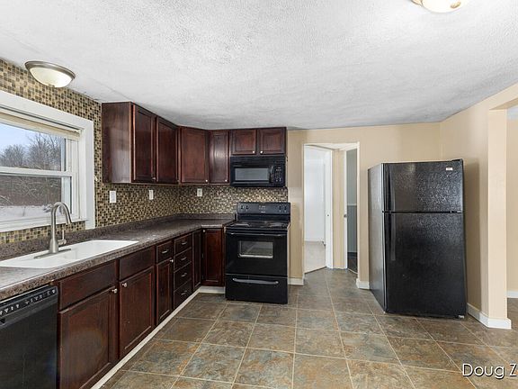 4th image of 12040 Macclain St NE