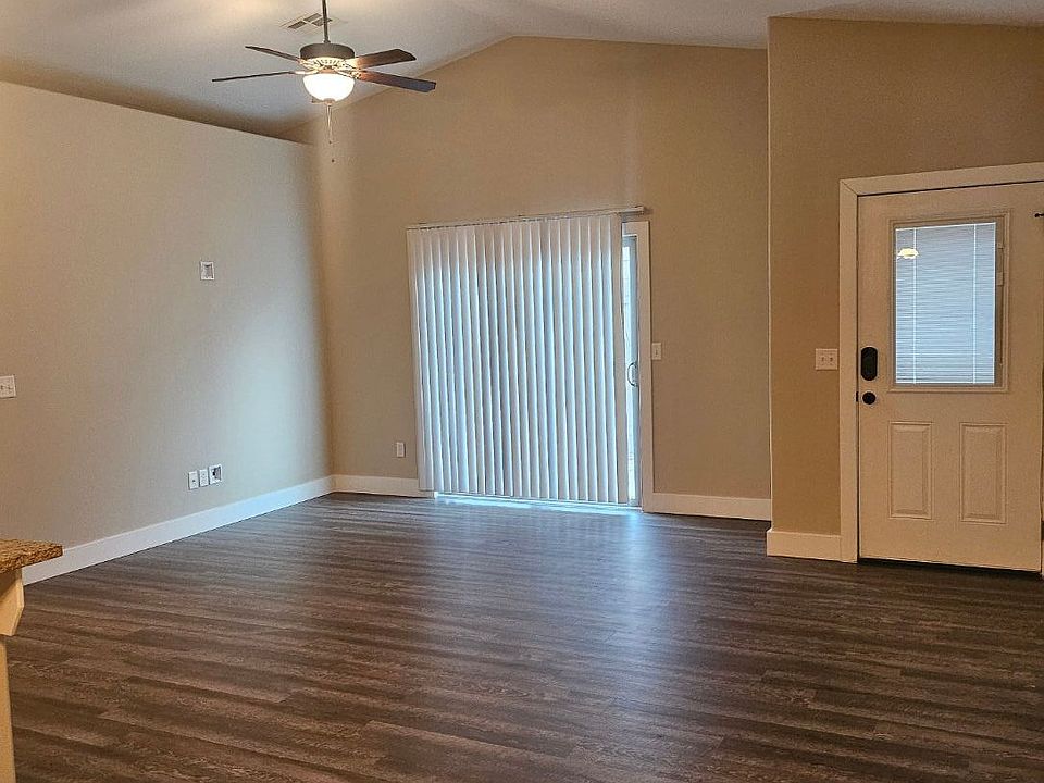 VIEW FROM DINING AREA PATIO DOOR - FRONT DOOR