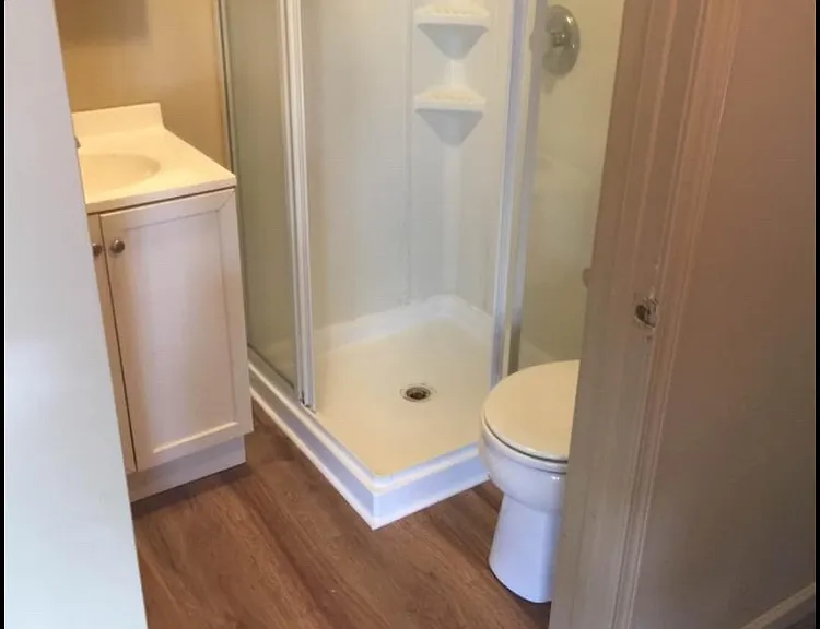 8853 S Seneca St #UPSTAIRS EFFICIENCY — Photo 1
