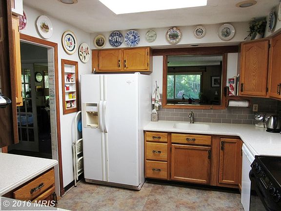 Kitchen opening to family room addition