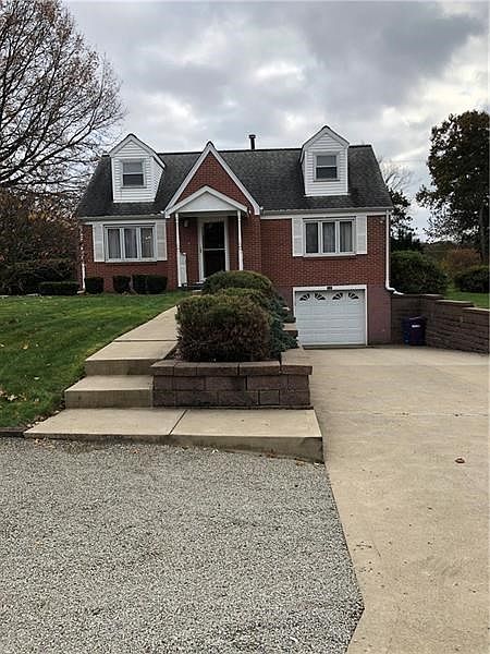 Extraordinarily Maintained Brick CapeCod.