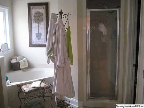 Master bath has jetted garden tub, separate shower & walk-in closet