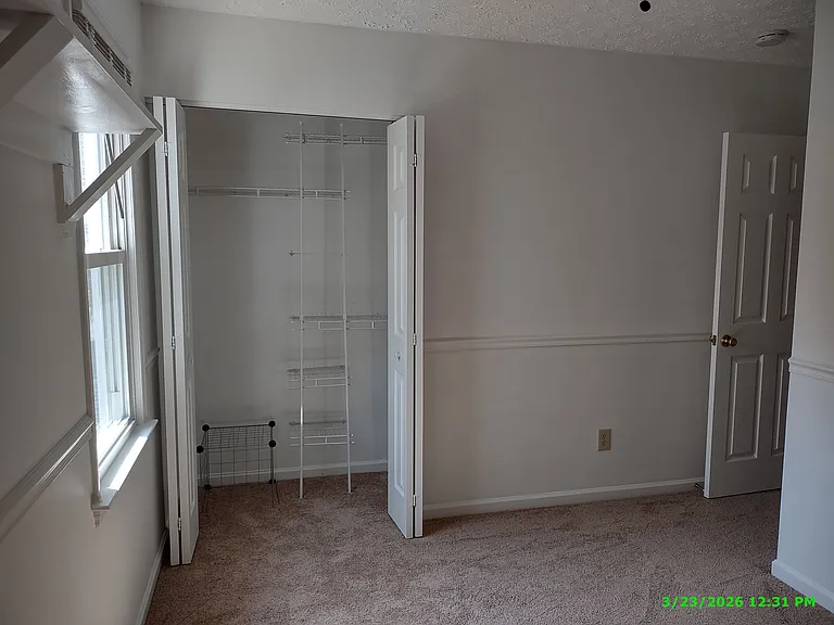 This photo has not been altered in any way: no edits or filters have been applied to try to deceive the viewer by having the room appear larger or brighter than it actually is.