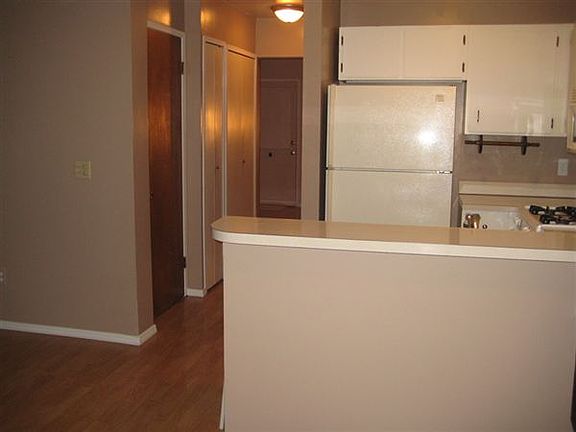 Kitchen/hallway to living room, view from dining room/den ar