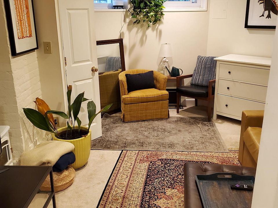 Living Room (two windows face to street but private) when occupied by previous tenant. View from kitchen