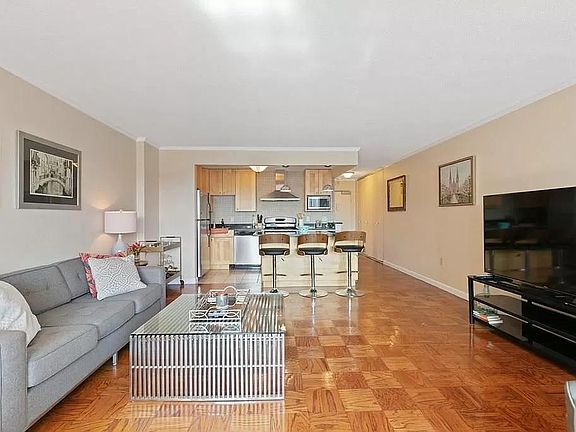Open concept kitchen and living room space.
