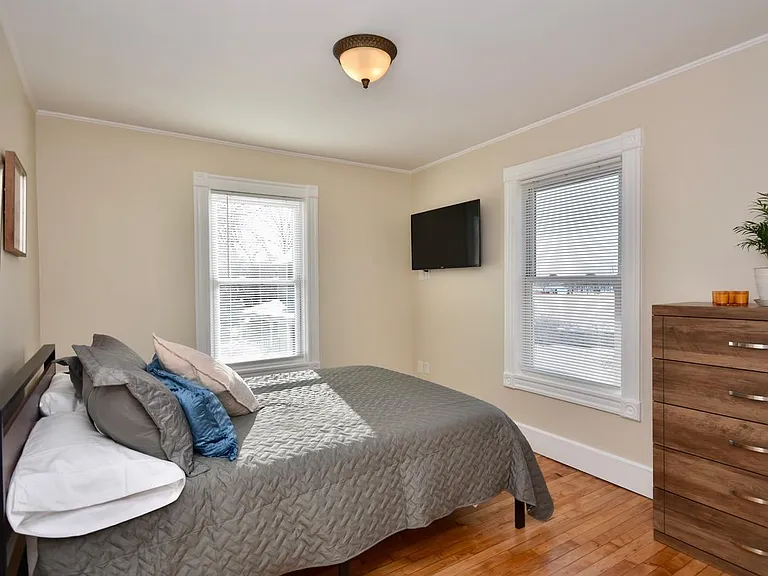 Bedroom with queen bed and 43" Smart TV, Payson Park and Back Cove View