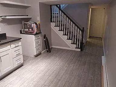 Finished basement with eat in kitchenette.