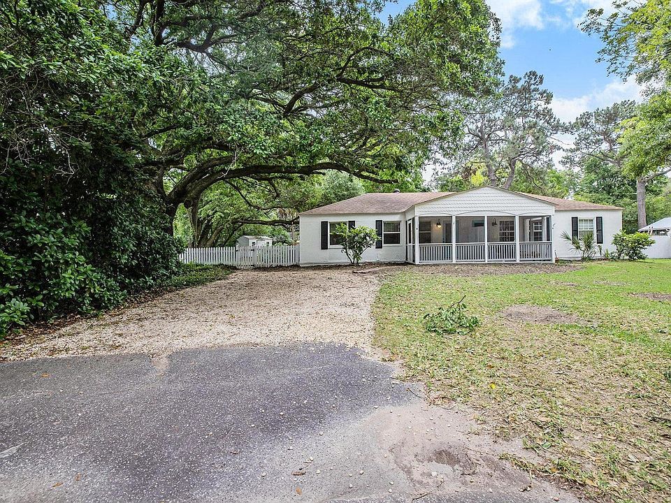 Large parking area with space for numerous vehicles or boat