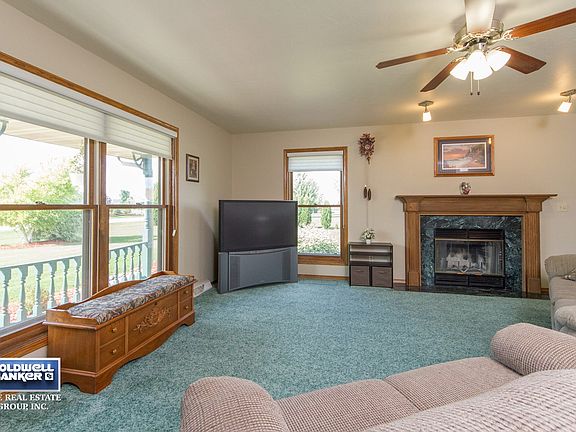 Wood Fireplace & Lots Of Natural Lighting!