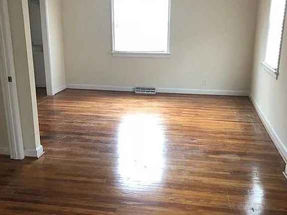 LARGE MASTER BEDROOM (2 BEDROOM WERE COMBINED INTO 1) ROOM FOR BEDROOM AND SITTING AREA/NURSERY. LARGE CLOSET WITH RACKS AND SHELVES