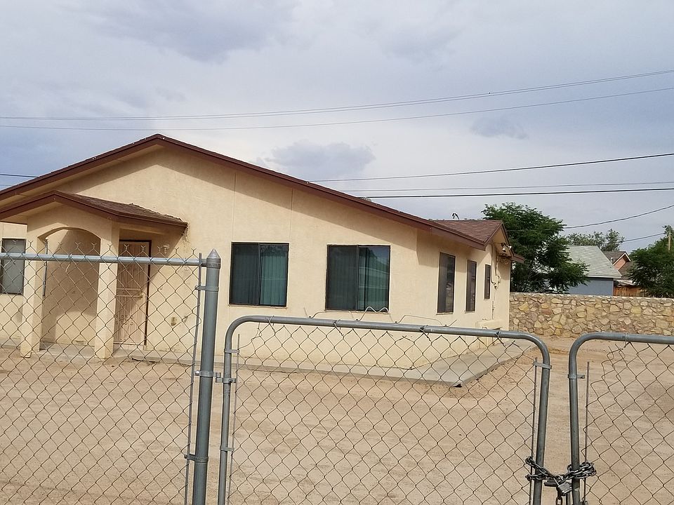 Front of the house is fenced in.