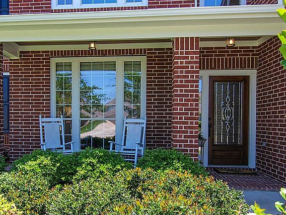 There's just something about a front porch!  A great place to relax and watch the kids playing on this quiet cul-de-sac street.