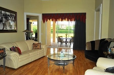 Hardwood Flooring, Vanishing Sliding Doors, Plantation Shutters