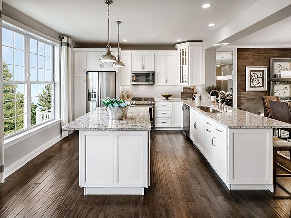 Eat-in kitchen with double islands.