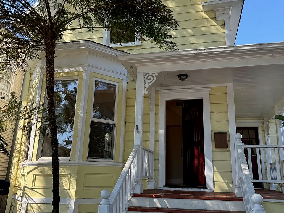 Exterior view of 2 story Victorian Home for rent. Historical District Santa Cruz.