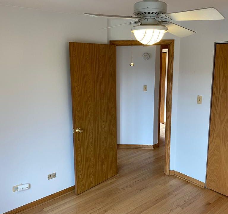 Master bedroom entrance and ceiling fan.