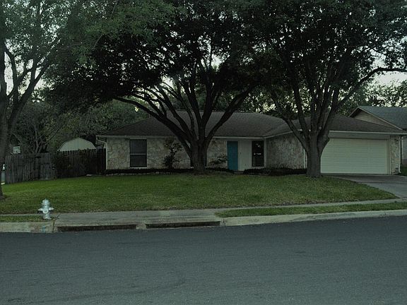 large corner lot with mature trees
