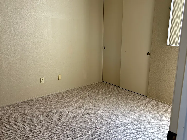 Bedroom #2 can fit a full or queen bed.