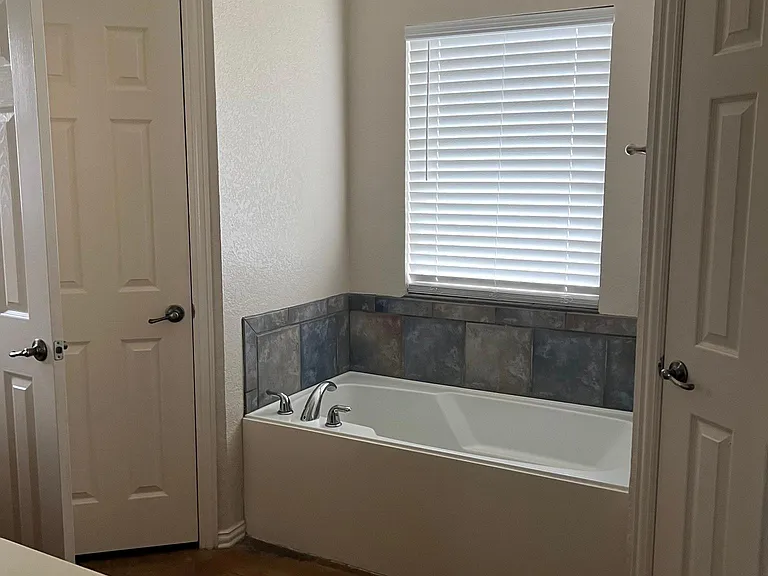 Master Garden Tub
Double walk-in closets
