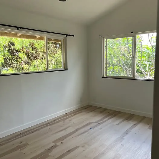 Bedroom 2. Lots of natural lighting.