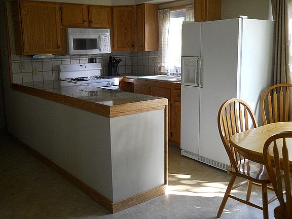 Kitchen with gas range, french door refrigerator/ice maker,