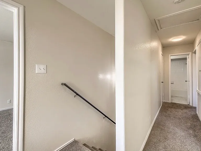 Second floor hallway. Bathroom is at the end of the hall.