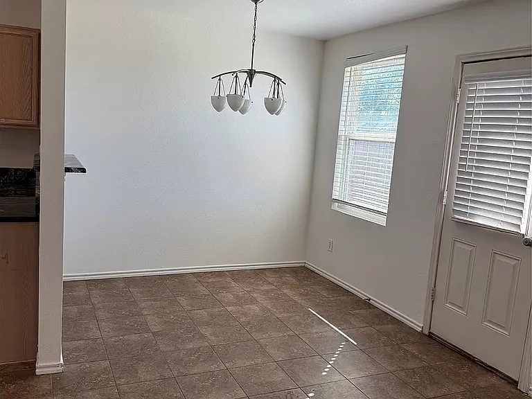 Dining off of kitchen and den