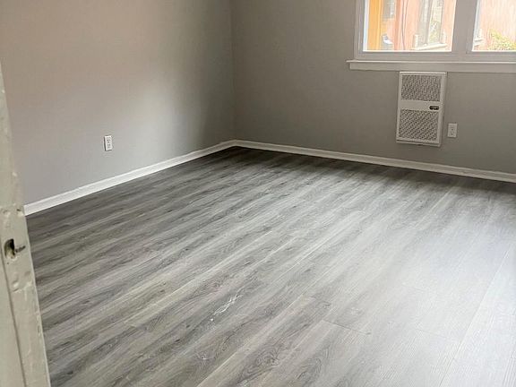 Master bedroom freshly painted with new flooring