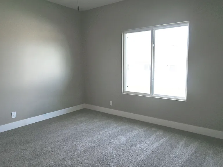 Natural light coming into a bedroom.