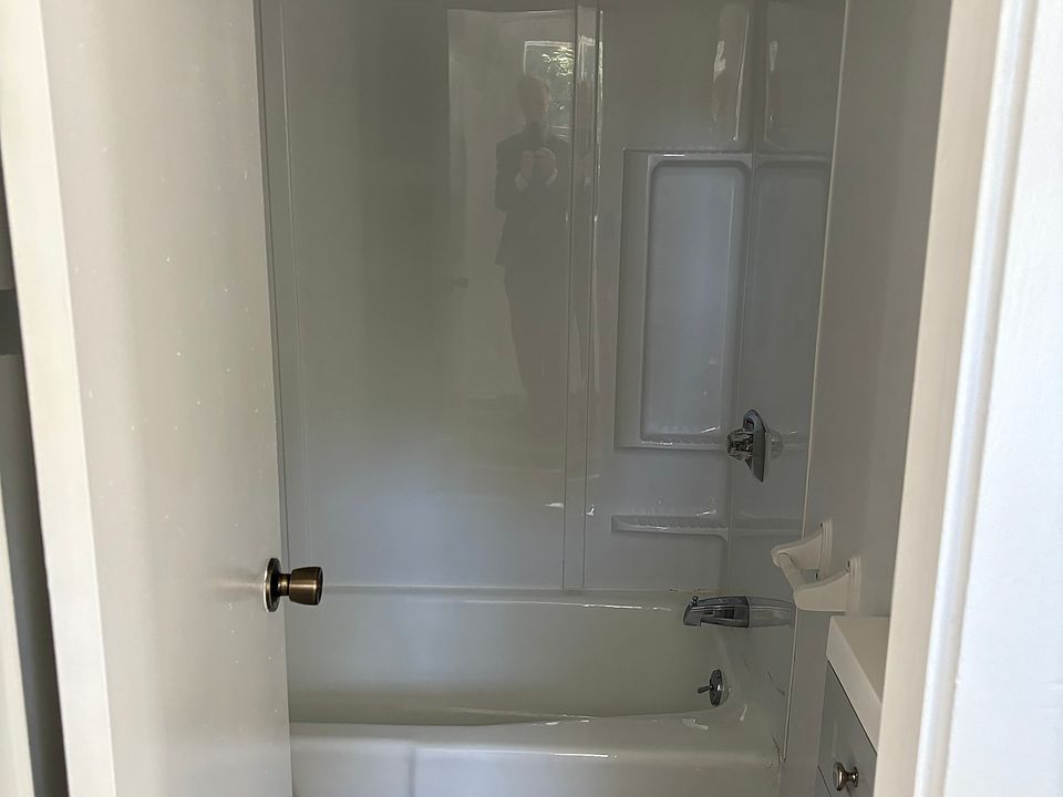 Small bathroom with shower.