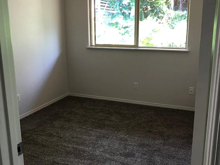 1st bedroom on left slider closet one window