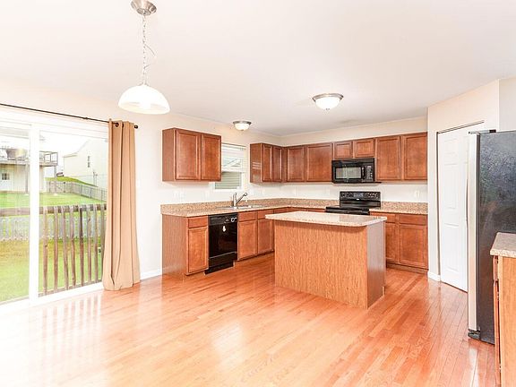 Kitchen with Eat-in Dining, Built-in Island, Gives You the Perfect Opportunity to Build the Porch, Deck or Patio, You Want Right