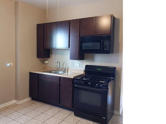 2nd image of 10723 S Michigan Ave #1