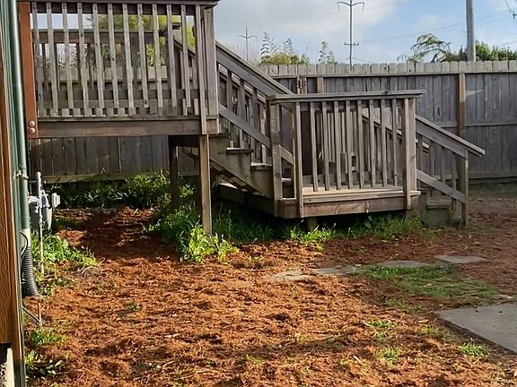 This is the entrance and half of the yard. This side gets the most sun and could be a great garden.