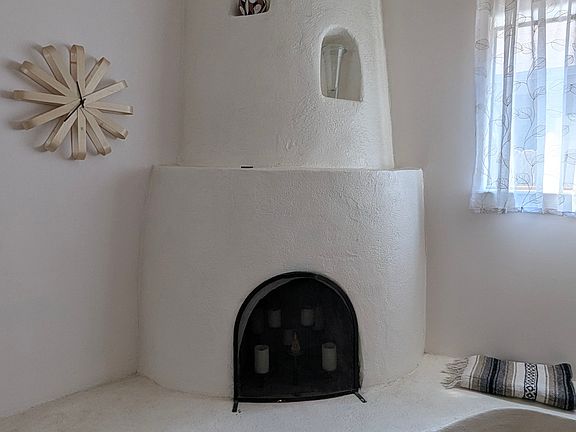 Traditional kiva fireplace (no fires allowed)
