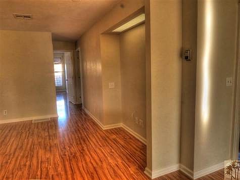No space is lost in halls. View from family room to master bedroom.