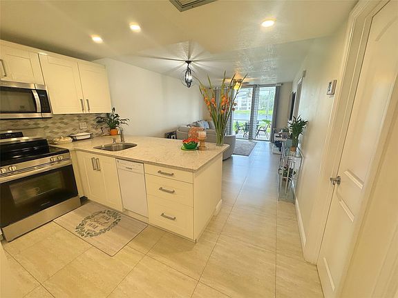 3rd image of 9440 Poinciana Place #105