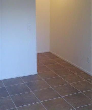 Master Bedroom Leading to Master Bathroom (Tile Flooring)!