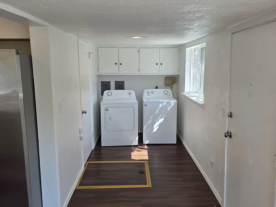 washer / dryer (door to large pantry left of washer)