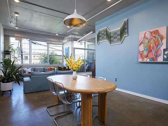 Dining room showcases a feature wall. A canvas for creativity