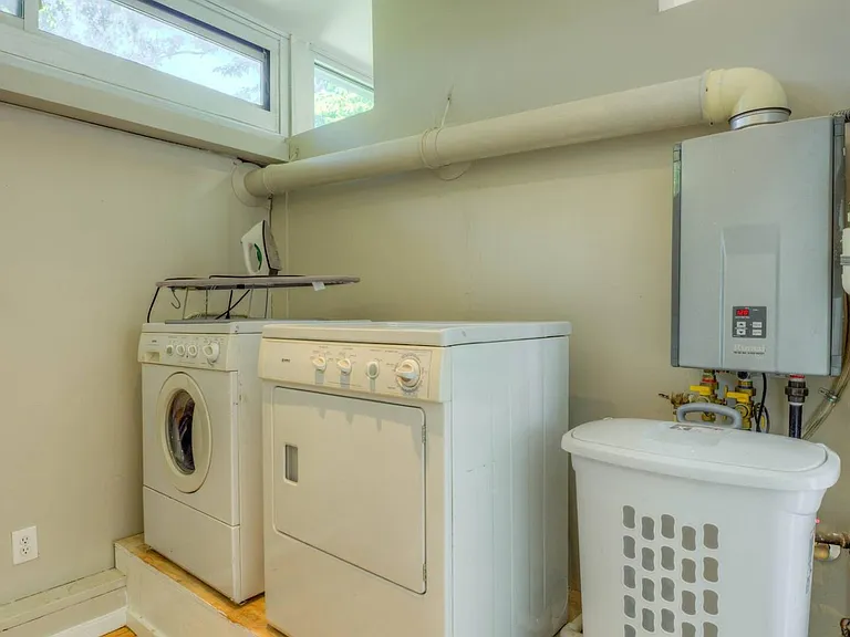 In unit washer and dryer. There is a washer and dryer upstairs and a washer/dryer connection downstairs if tenant desires to add a 2nd unit.