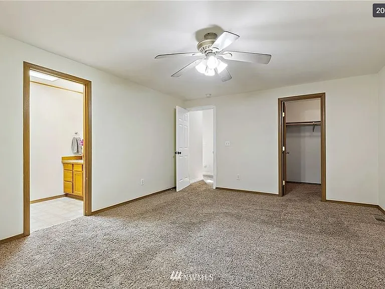 Master Bedroom w/ Walk in Closet.