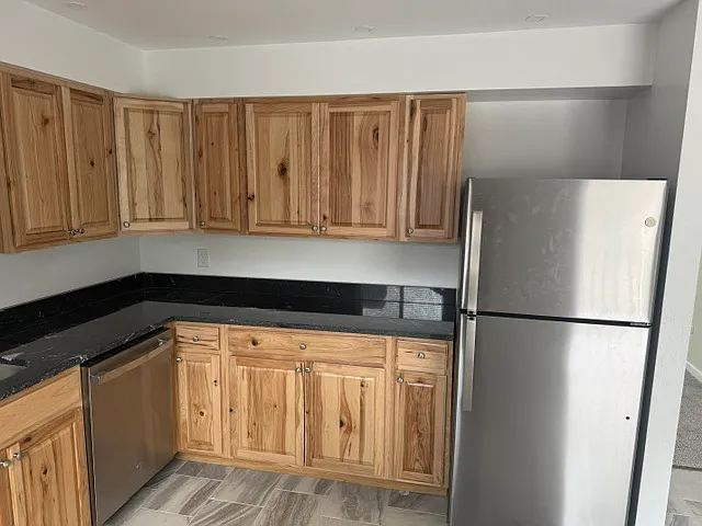 KITCHEN WITH ALL NEW STAINLESS STEEL APPLIANCES